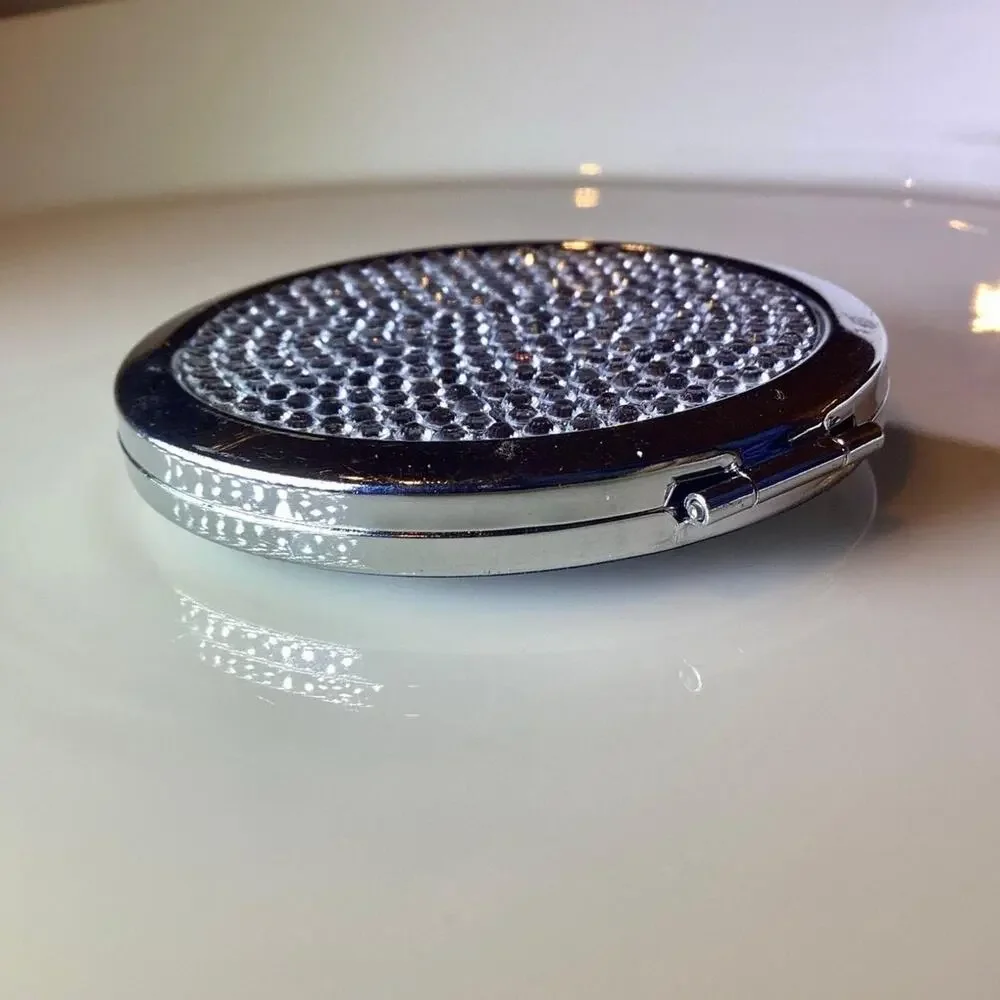 Magnifying compact mirror brand new